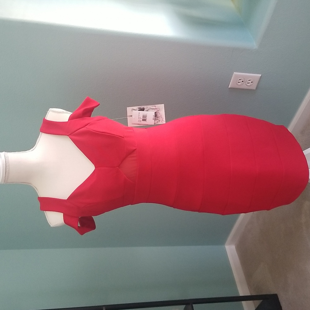 New w/ tags, sexy red dress by Honey and Rosie.